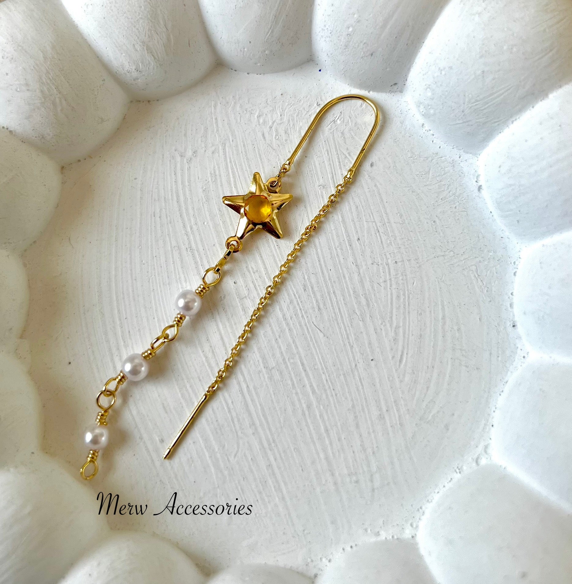 Orange Star double chain piercing