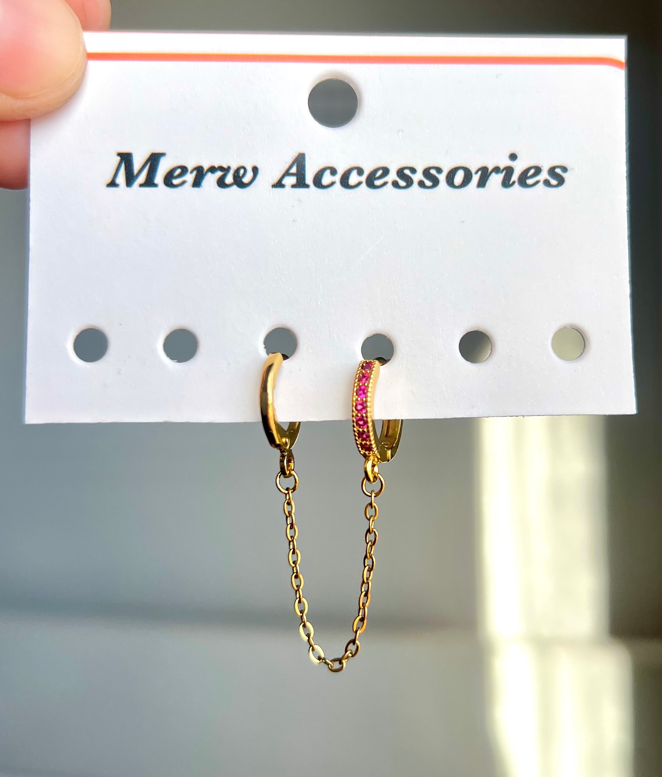 Pink stones connect earring